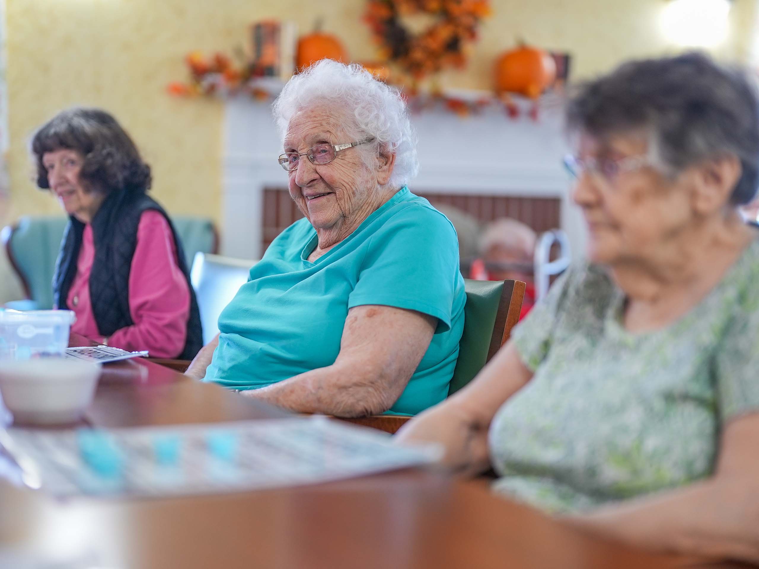 women smiling playing bingo